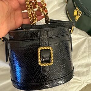 Black Snakeskin Bucket Bag with Gold Buckle Accent